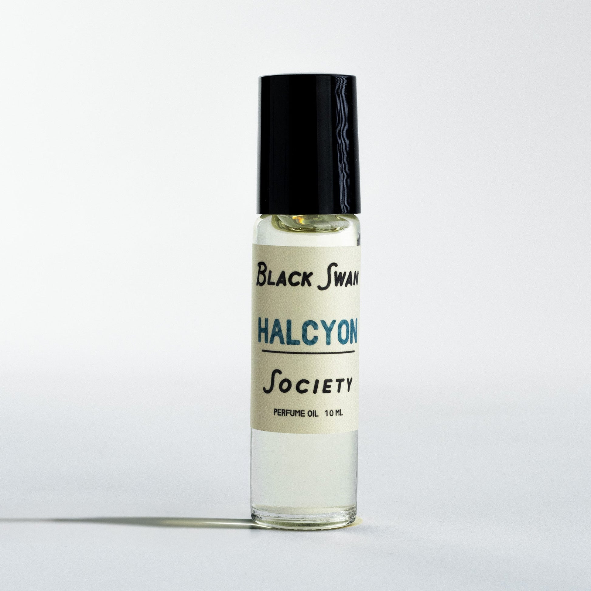 Perfume Oil Rollerball bottle with the label Black Swan Society Halcyon 10ml