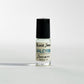 Perfume Oil Rollerball bottle with the label Black Swan Society Halcyon 4ml
